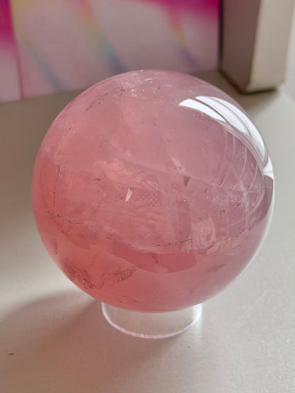 Gemmy purple-pink toned star rose quartz sphere