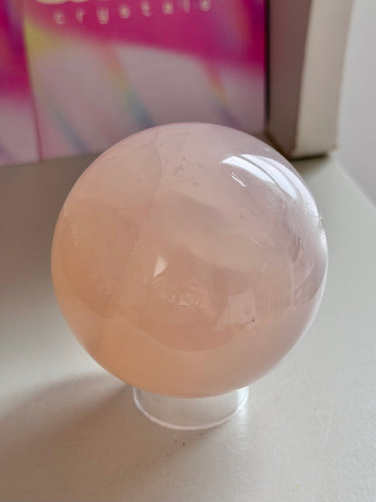 Peach 12-ray star rose quartz sphere