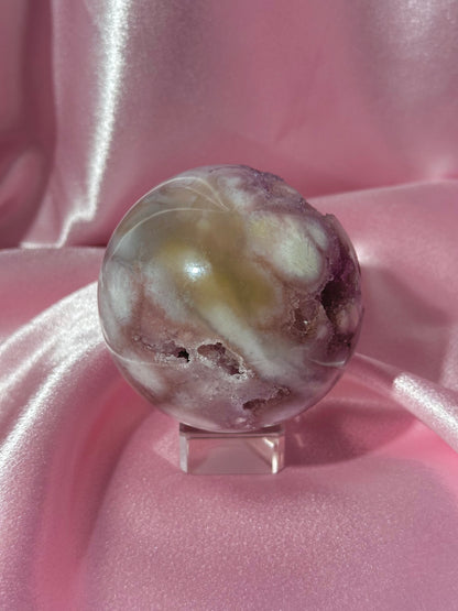 Brazilian pink amethyst x flower agate sphere with druzy cave