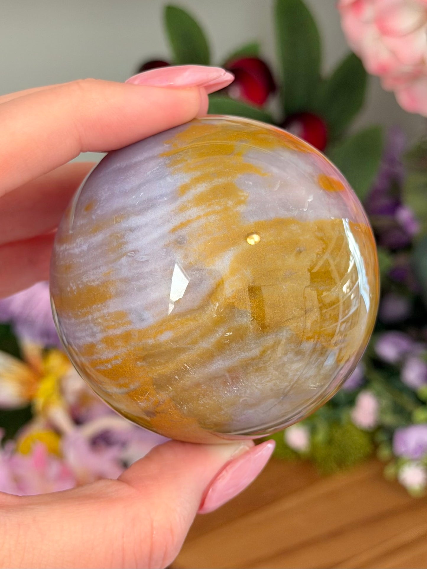 Glowy purple sea jasper sphere