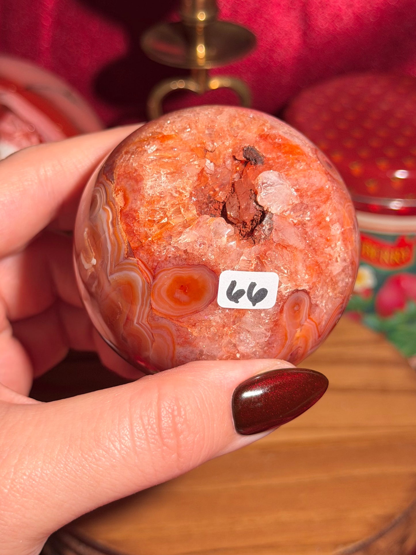 Mossy carnelian sphere with quartz cave