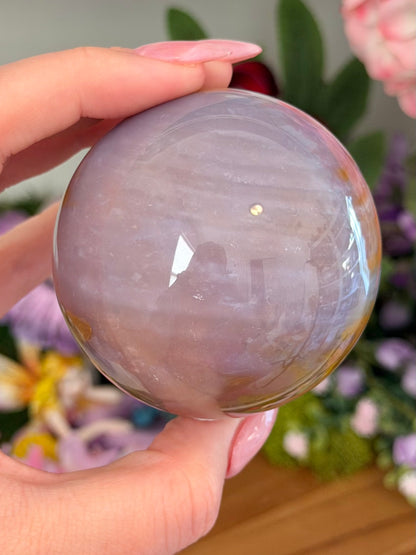 Glowy purple sea jasper sphere