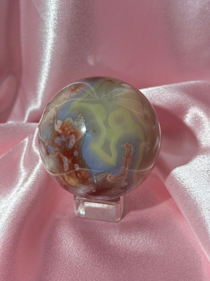 Perfect pastel peachy yellow & blue flower agate sphere from Madagascar