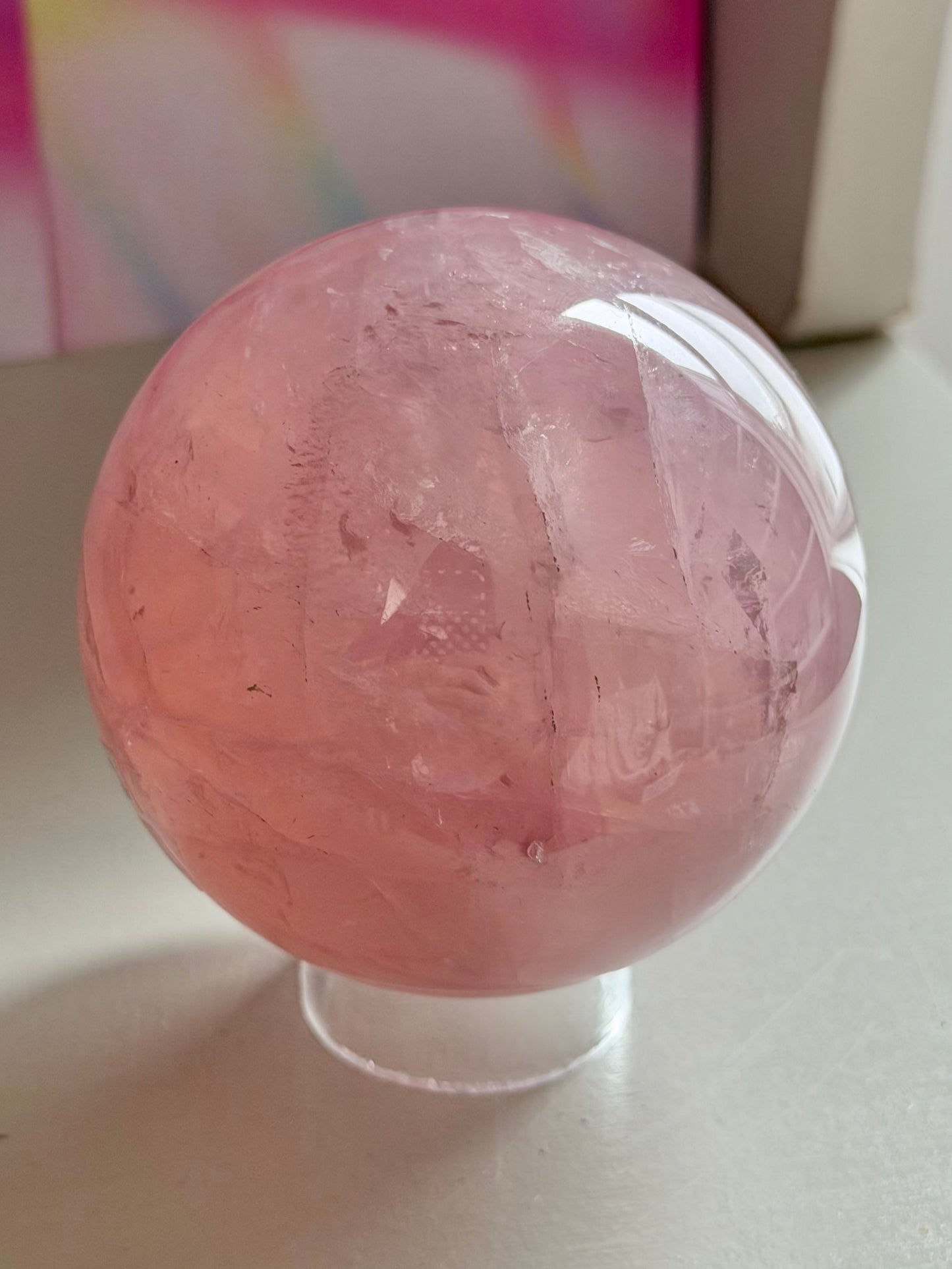 Gemmy purple-pink toned star rose quartz sphere