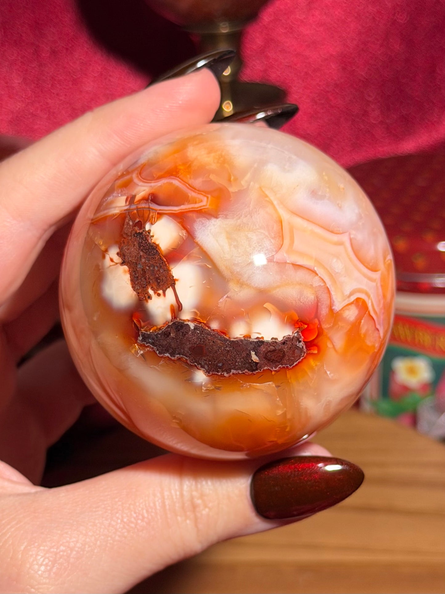 Glowy yellow carnelian sphere with imperfect fill spots