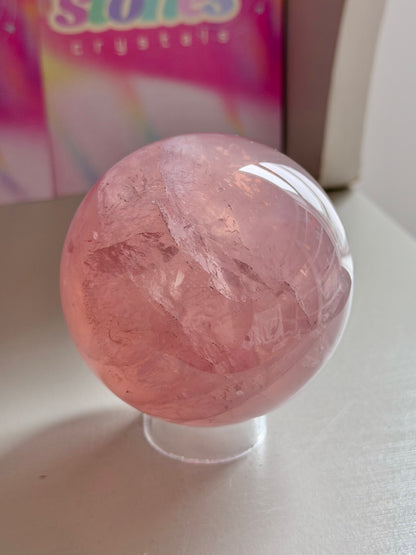 Gemmy purple-pink toned star rose quartz sphere