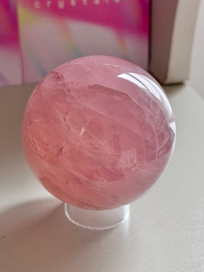 Gemmy purple-pink toned star rose quartz sphere