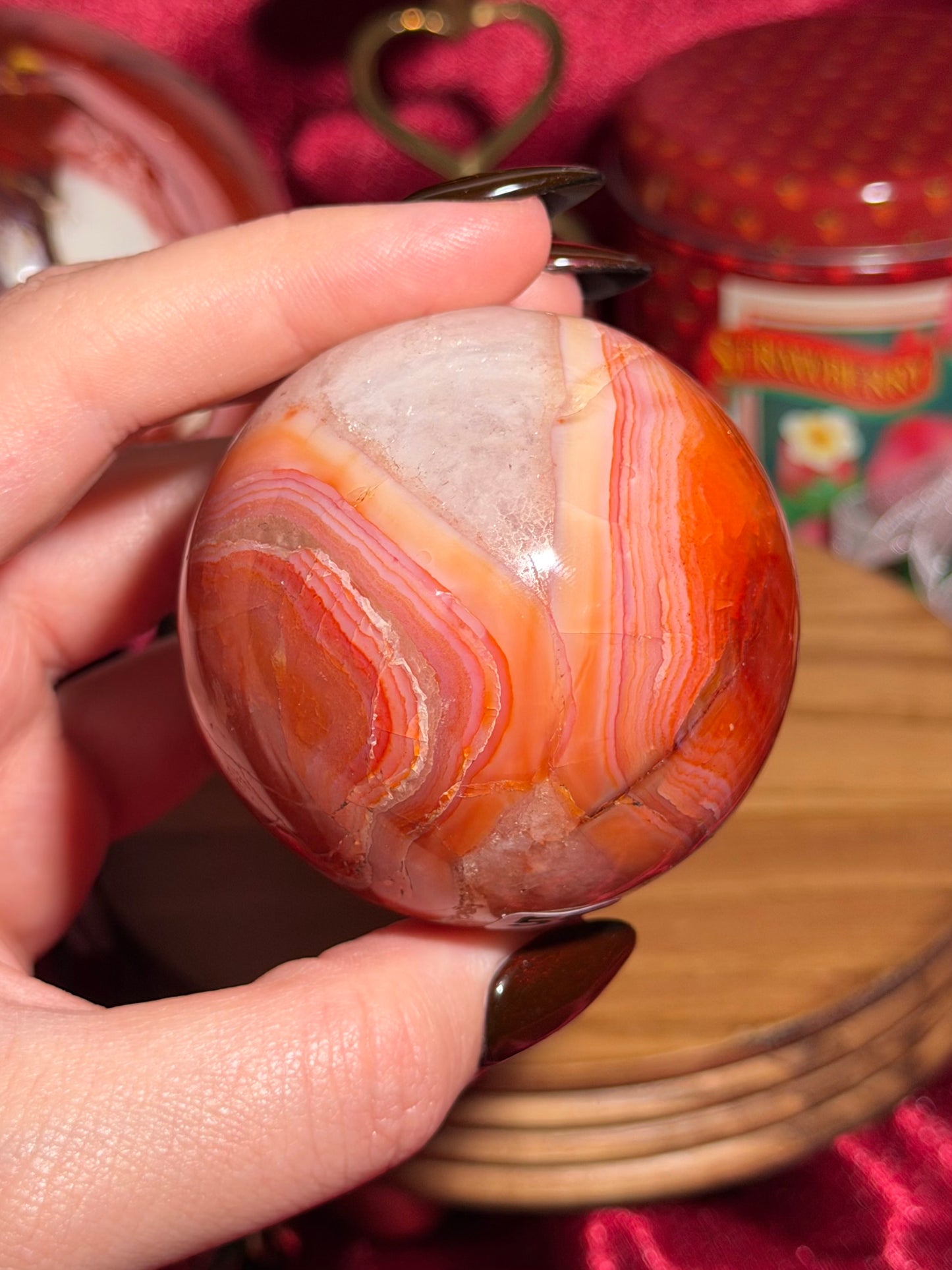 Rainbow carnelian sphere with quartz