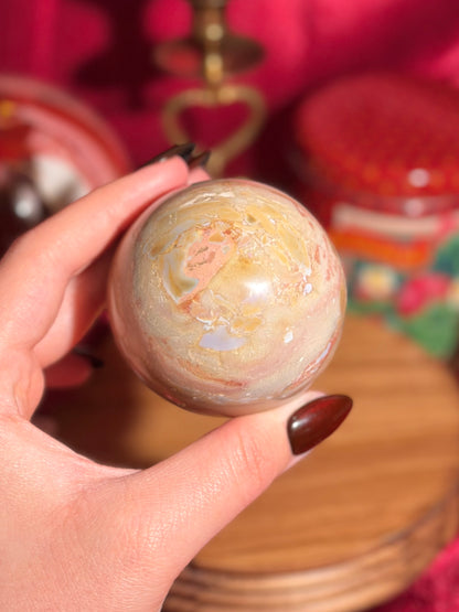 Warm toned polychrome jasper sphere