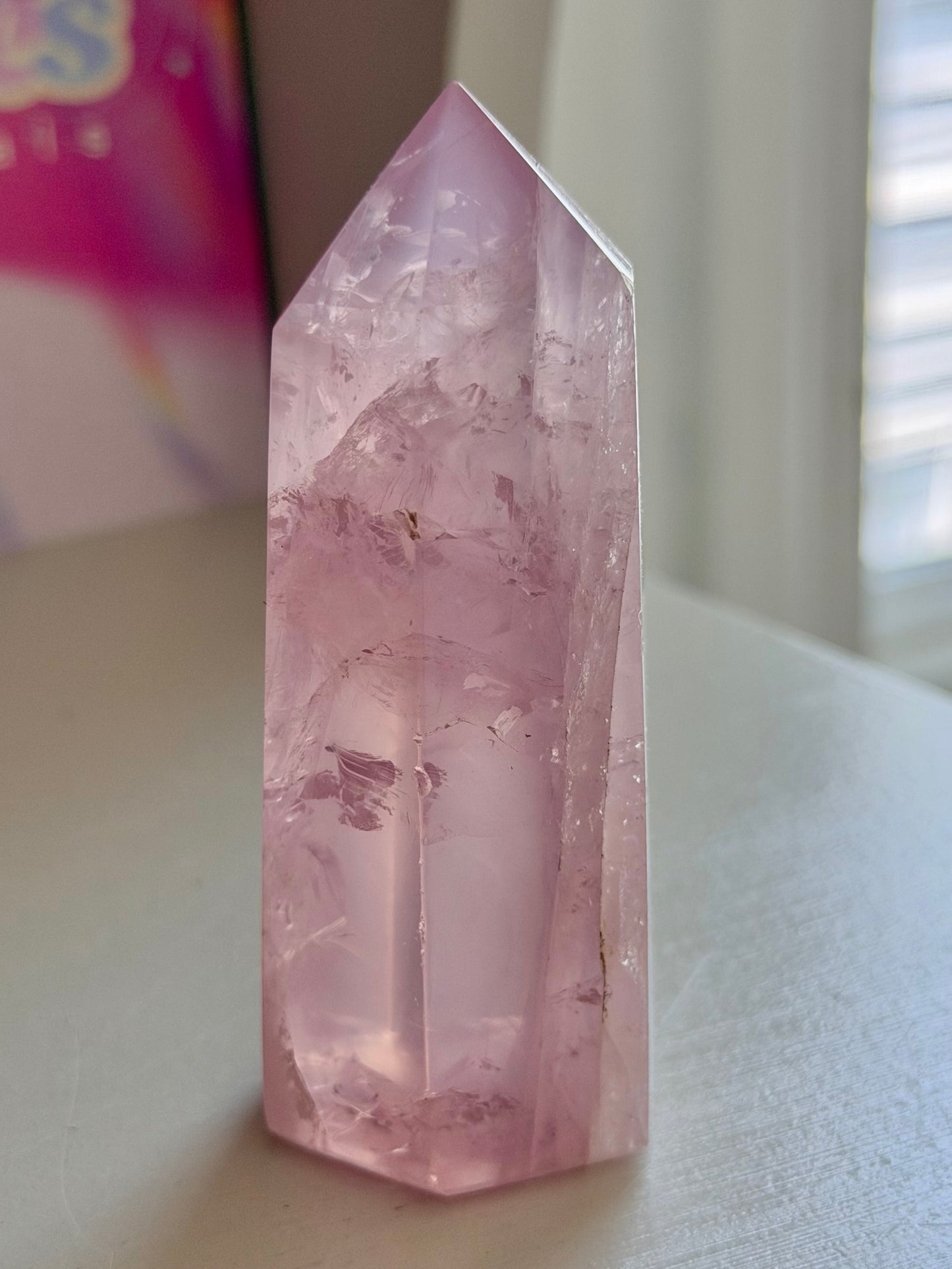 Gemmy purple-toned rose quartz tower