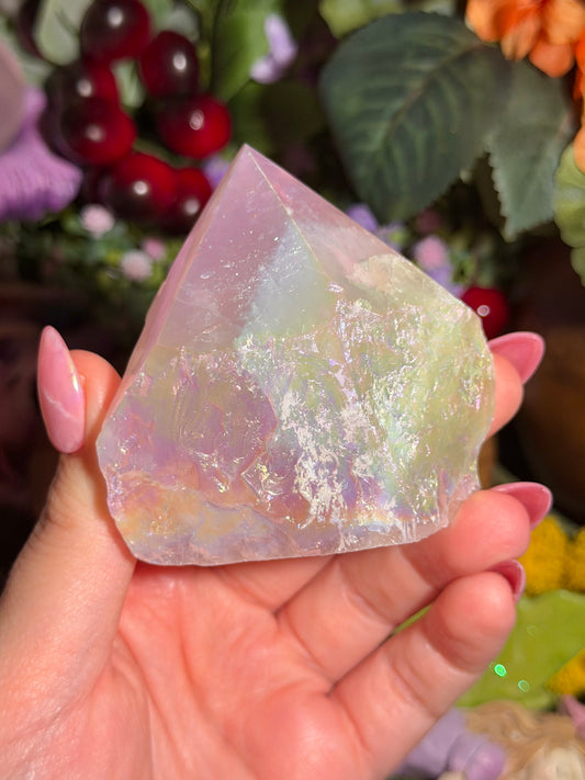 Aura coated rose quartz half polished point from Brazil