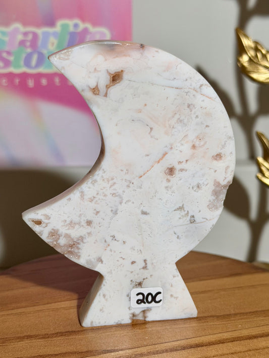 Pink carnelian self-standing moon carving from Indonesia (20C)
