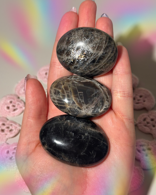 Black moonstone with sunstone palmstones - intuitive pick