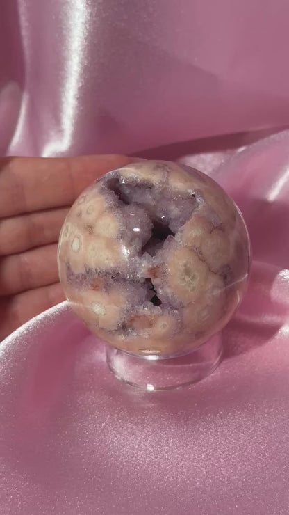 Brazilian pink amethyst x flower agate sphere with druzy cave
