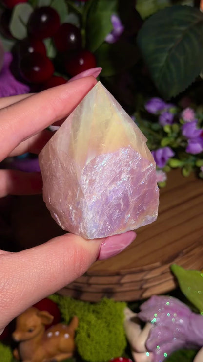 Aura coated rose quartz half polished point from Brazil