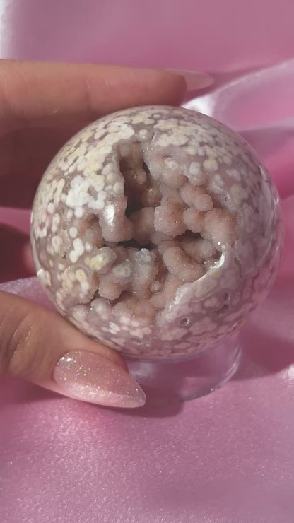 Pink pastel flower agate sphere from Madagascar with bubby druzy