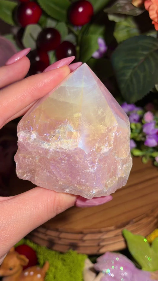 Aura coated rose quartz half polished point from Brazil
