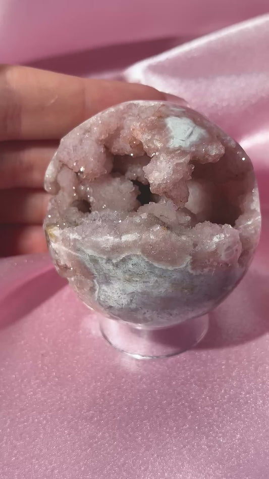 Brazilian pink amethyst sphere with unique bubbly druzy cave