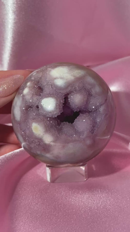 Brazilian pink amethyst x flower agate sphere with druzy cave