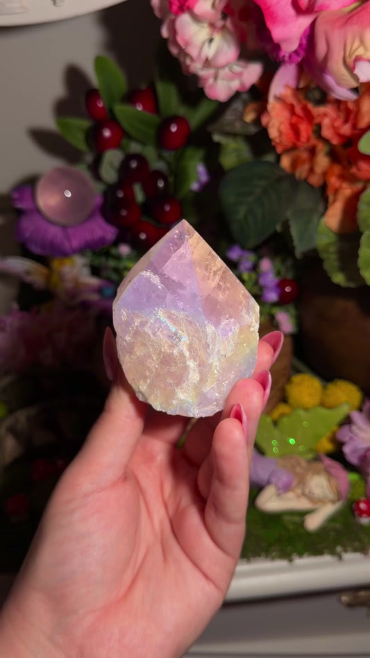 Aura coated rose quartz half polished point from Brazil