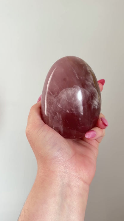 Glassy “guava” pink rose quartz freeform