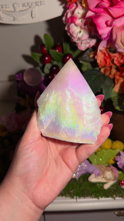 Aura coated rose quartz half polished point from Brazil