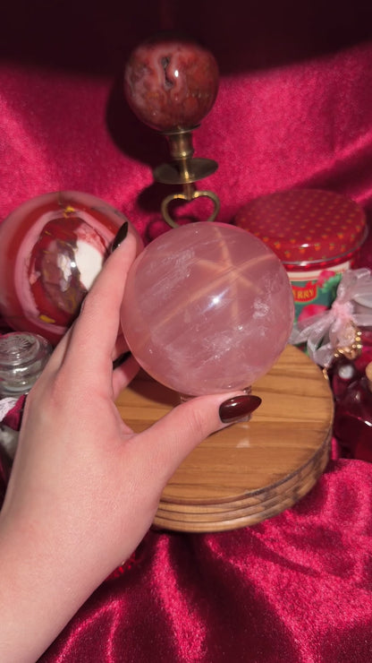 High quality star rose quartz sphere with golden glittery flash