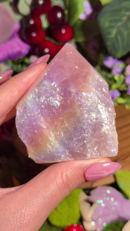 Aura coated rose quartz half polished point from Brazil